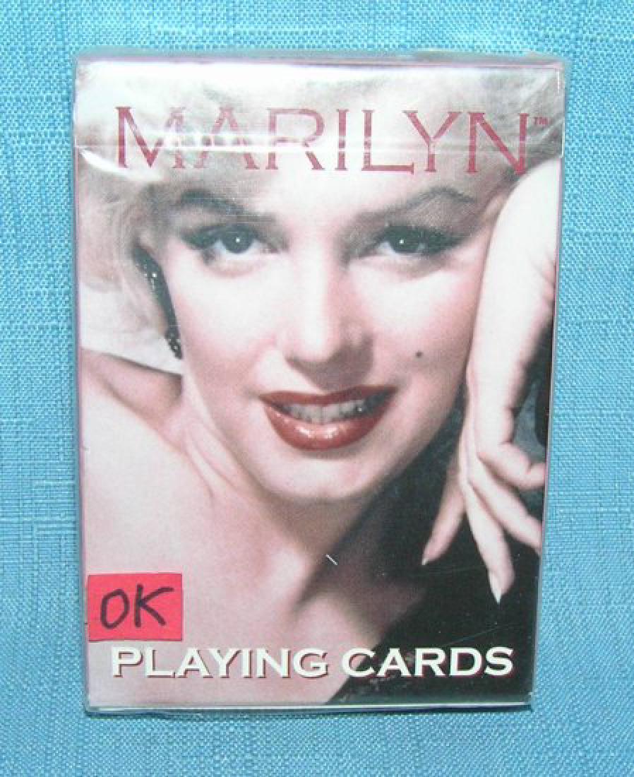 Marilyn Monroe pictural playing cards: Marilyn Monroe pictural playing cards features color and black and white images, mint and sealed est. value $15.00-$20.00