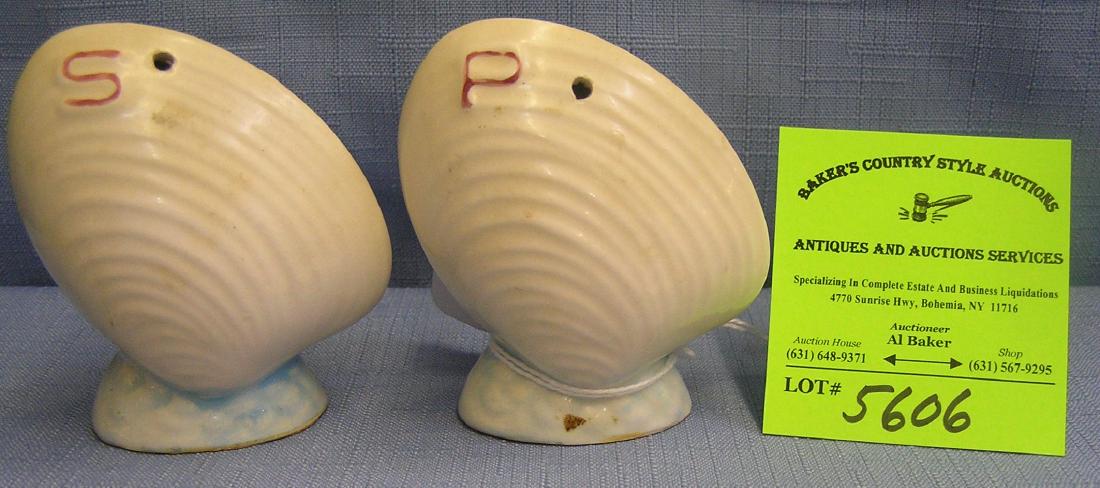 Pair of vintage clam shell shaped S & P shakers: Pair of vintage clam shell shaped salt and pepper shakers est. value $20.00-$25.00