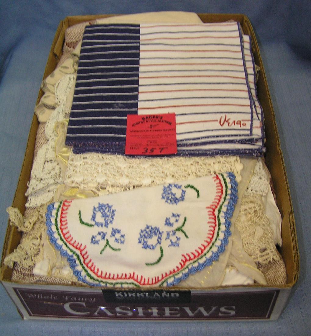 Box full of vintage linens: Box full of vintage linens est. value $30.00-$35.00