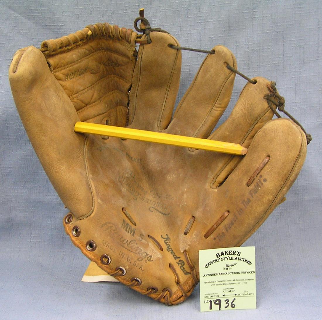 Mickey Mantle baseball glove by Rawling: Vintage leather Mickey Mantle baseball glove by Rawling est. value $150.00-$200.00