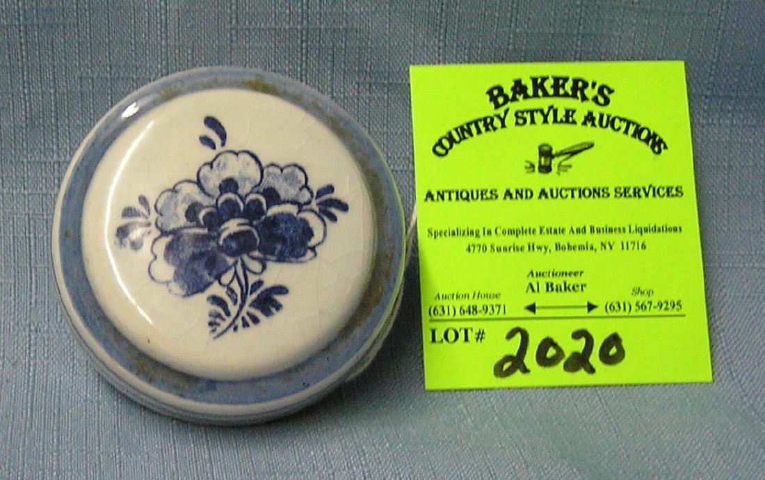 Floral decorated blue willow jar cover: Floral decorated blue willow jar cover est. value $15.00-$20.00