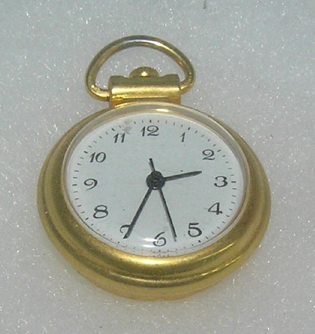 Gold toned pendant watch: Gold toned pendant watch est. value $30.00-$35.00