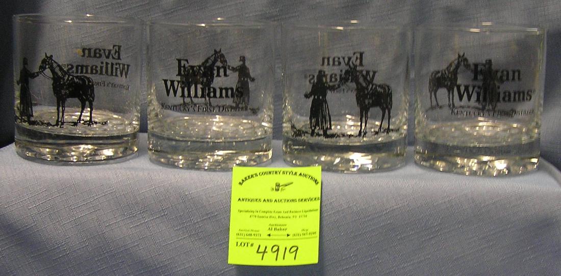Evan Williams Kentucky Whisky advertising glasses: Group of four Evan Williams Kentucky Whisky advertising glasses $40.00-$60.00