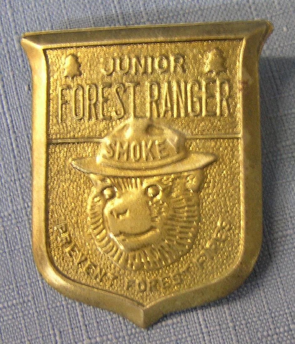 Vintage Smokey the bear forest ranger badge: Vintage brass Smokey the bear forest ranger badge $65.00-$75.00
