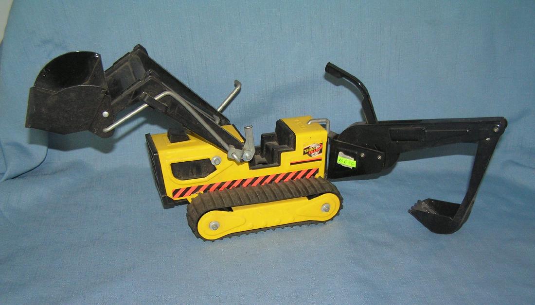 Tonka metal bull dozer and back ho: Tonka metal bull dozer and back ho large metal Tonka truck est. value $35.00-$45.00