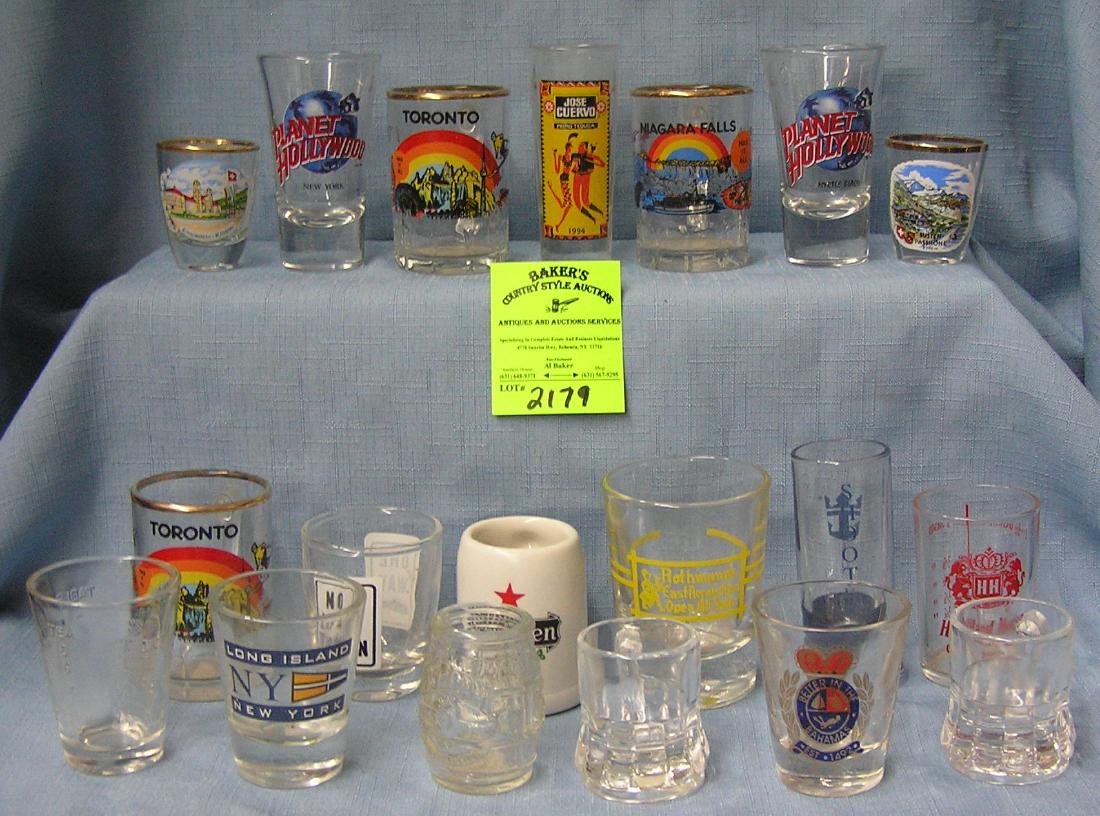 Large collection of vintage shot glasses: Large collection of vintage shot glasses mostly advertising and decorated est. value $50.00-$75.00