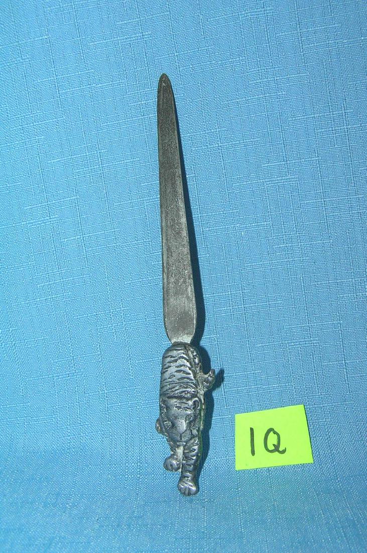 Exxon Tiger promotional figural letter opener: Exxon Tiger promotional figural letter opener all metal circa 1940's- 60's est. value $35.00-$40.00