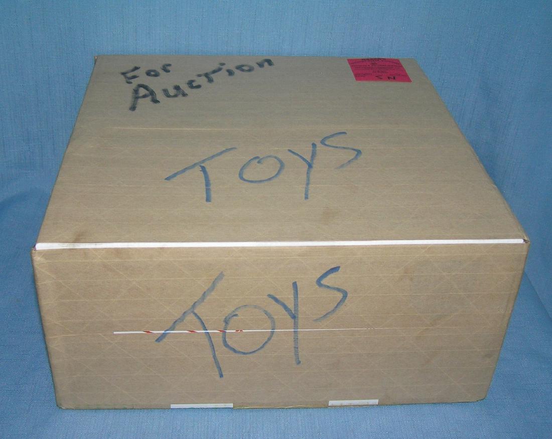 Moving and Storage Company mystery box marked toys: Moving and Storage Company mystery box lot marked toys est. value $25.00-$30.00