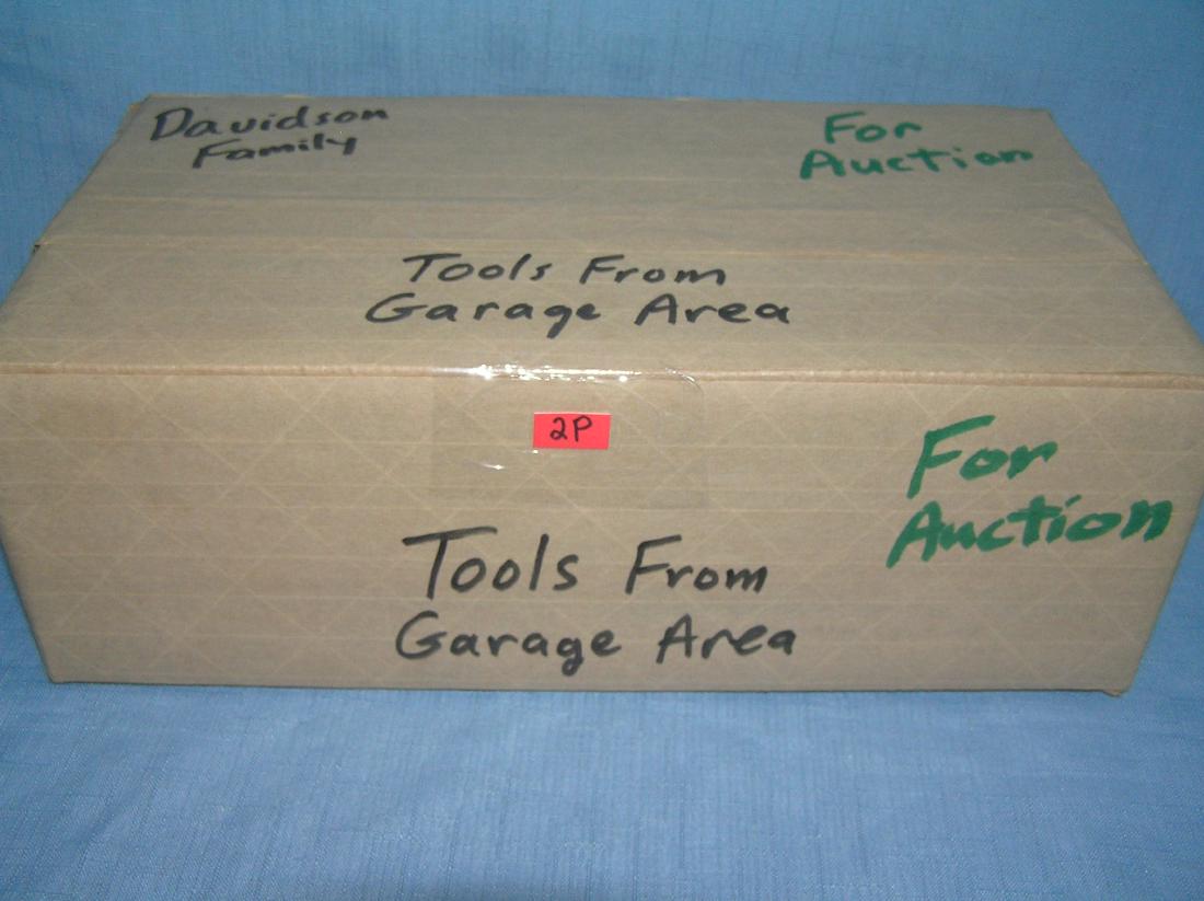 Moving and storge Co. mystery box lot: Moving and storge Co. mystery box lot marked Davidson family tools from garage area est. value $25.00-$30.00