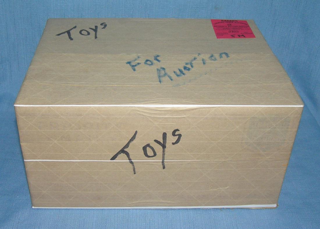 Moving and Storage Company mystery box marked toys: Moving and Storage Company mystery box lot marked toys est. value $25.00-$30.00