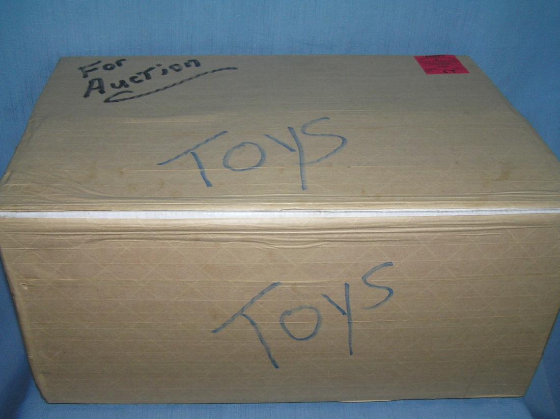 Moving and Storage Company mystery box marked toys: Moving and Storage Company mystery box lot marked toys est. value $25.00-$30.00