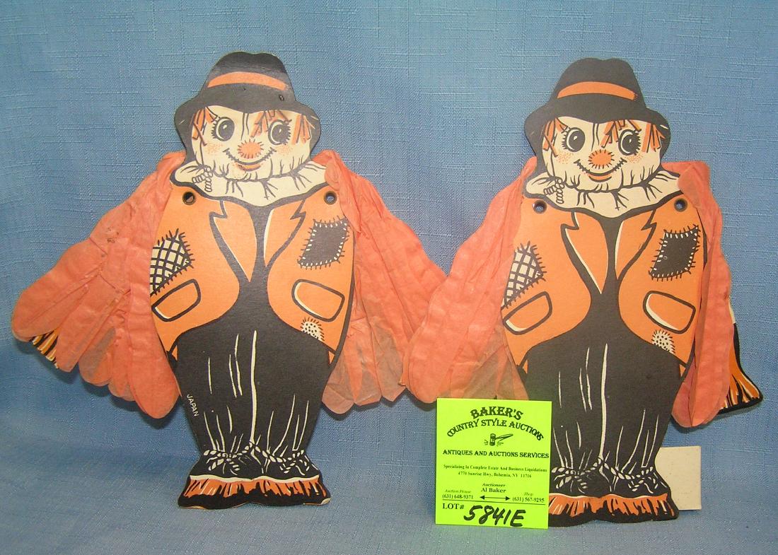 Vintage die cut scare crow Halloween decorations: Pair of vintage die cut scare crow Halloween decorations est. value $30.00-$40.00