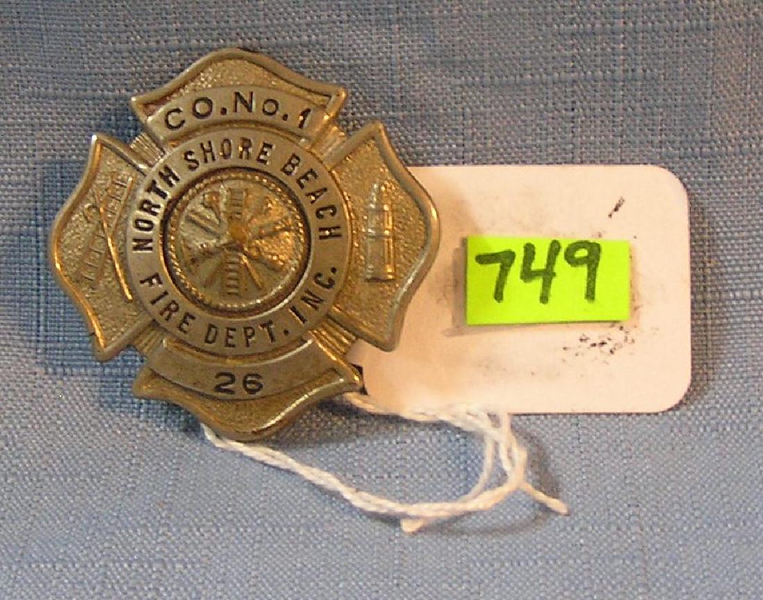 Vintage N. shore beach fire dept badge: Vintage North shore beach Long Island fire department badge est. value $100.00-$125.00