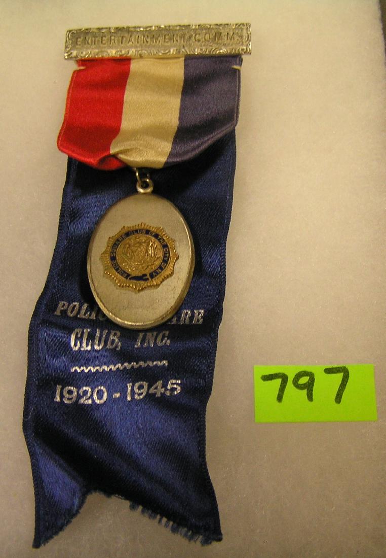 Antique police medal and ribbon set: Antique police medal and ribbon set dated 1920 to 1945 est. value $75.00-$100.00