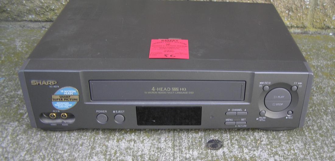 Sharp 4 Head VHS movie tape player: Sharp 4 Head VHS movie tape player est. value $45.00-$50.00