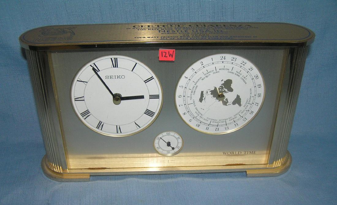 Seiko world time quartz brass and glass clock: Seiko world time quartz brass and glass clock a great Nestle Choclate Co. 28 year advertising presentation display piece est. value $75.00-$100.00