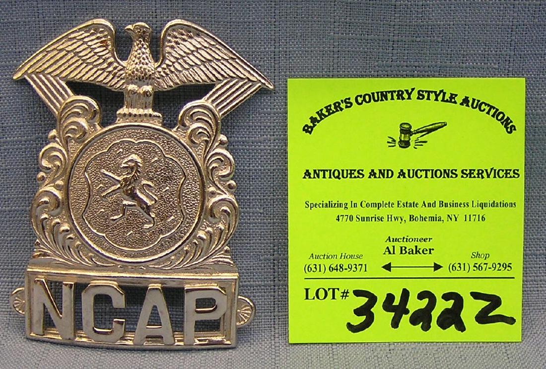 Vintage police badge: Vintage police badge est. value $75.00-$100.00