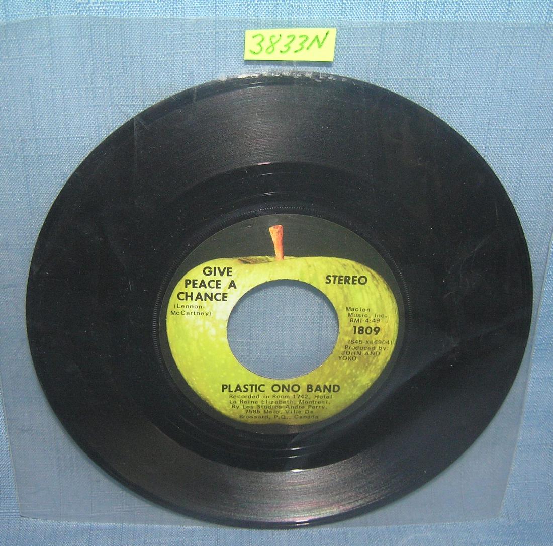 Yoko Ono and the Plastic Ono Band vintage 45 RPM record: Yoko Ono and the Plastic Ono Band vintage 45 RPM record featuring Give Peace a chance and Remember Love est. value $15.00-$20.00