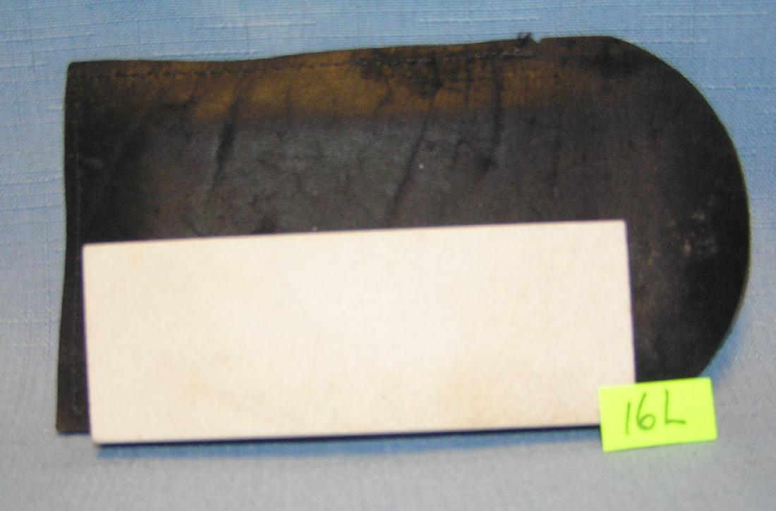 Genuine oil stone knife sharpening stone: Genuine oil stone knife sharpening stone with hand stitched case est. value $30.00-$35.00