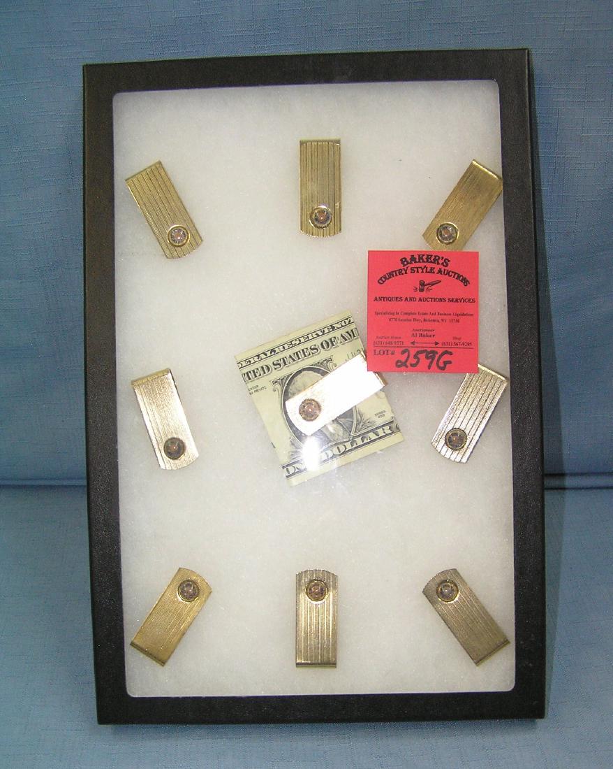 Collection of vintage gold plated money clips: Collection of vintage gold plated money clips est. value $100.00-$125.00