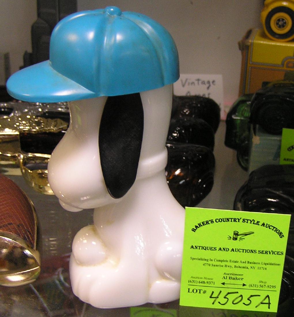 Vintage Snoopy figural aftershave decanter: Vintage Snoopy figural aftershave decanter by Avon dated 1969 $30.00-$35.00