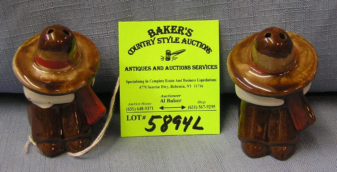 Mexicans with sombreros earthenware S&P shakers: Pair of Mexicans with sombreros taking a Siesta earthenware S&P shakers est. value $20.00-$30.00