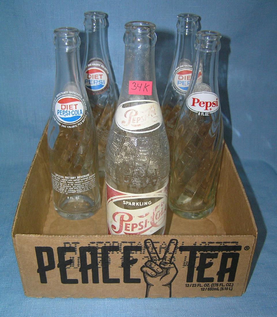Collection of vintage Pepsi soda bottles: Collection of vintage Pepsi soda bottles est. value $25.00-$30.00