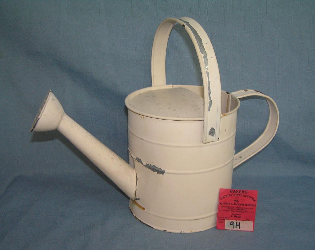 All metal watering cans: All metal watering can est. value $25.00-$30.00