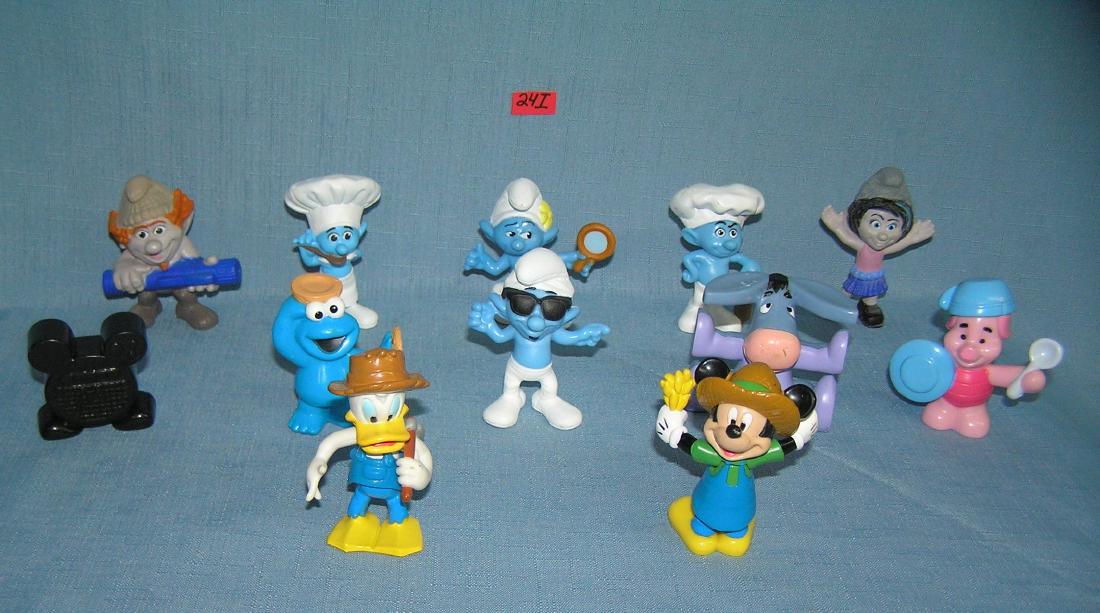 Collection of Smurf, Disney, Muppets and other: Collection of Smurf, Disney, Muppets and other figurines est. value $50.00-$60.00