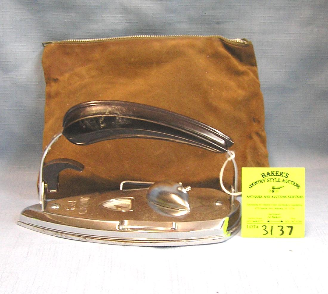 Antique electric iron with Bakelite handle: Antique electric iron with Bakelite handle est. value $40.00-$50.00