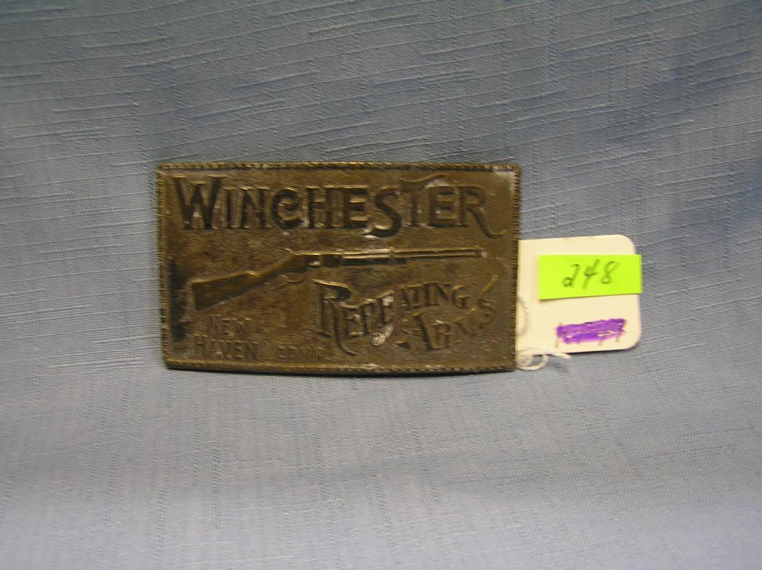 Brass Winchester advertising belt buckle: Brass Winchester advertising belt buckle circa 1950’s est. value $40.00-$60.00