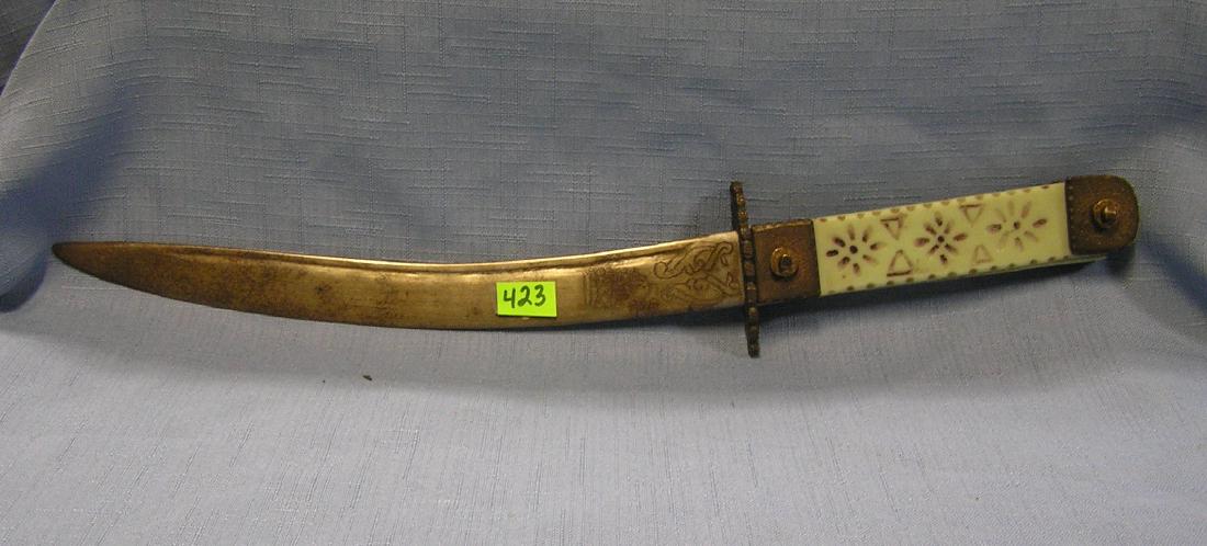 Vintage WWII handmade Trench Art dagger: Vintage WWII handmade Trench Art dagger with copper and Bakelite est. value $125.00-$150.00