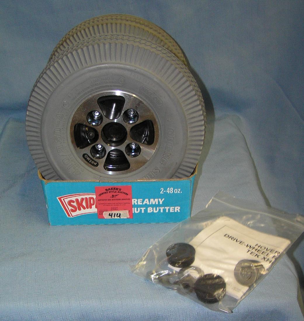 Pair of mobile cart or accessory chrome rims and tires: Pair of mobile cart or accessory chrome rims and tires est. value $65.00-$75.00