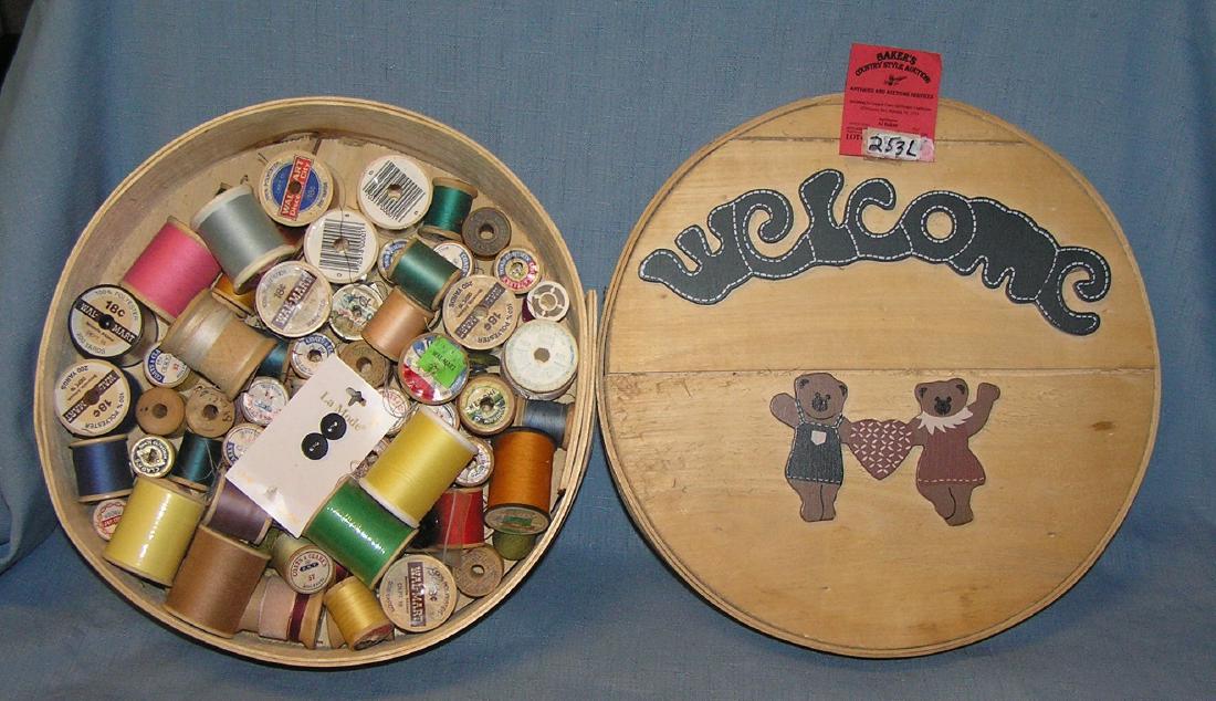 Bear decorated wooden sewing box: Bear decorated wooden sewing box filled with spools of thread est. value $35.00-$45.00