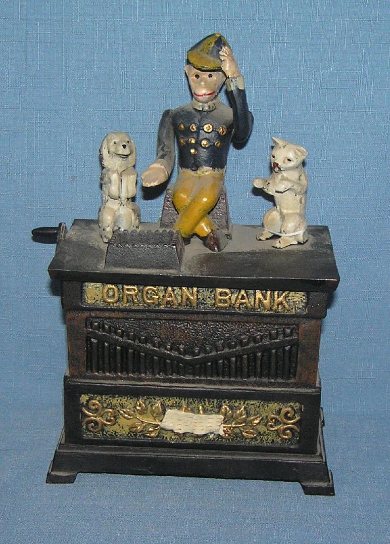Hand painted cast iron Organ mechanical bank: Hand painted cast iron Organ mechanical bank est. value $150.00-$200.00