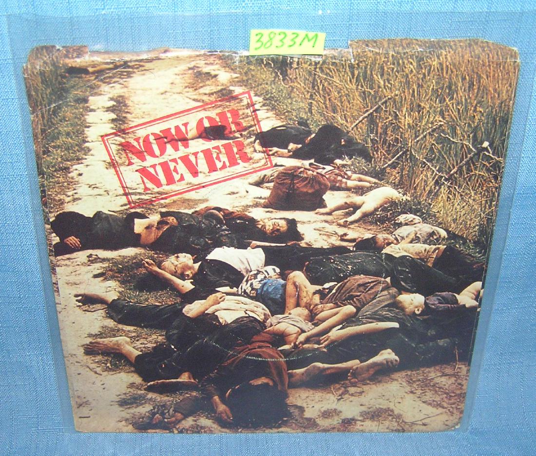 Yoko Ono Plastic Ono band 45 RPM record: Yoko Ono and the Plastic Ono band vintage 45 RPM record and picture sleeve featuring Now or Never and Move on Fast Apple records with very graphic double sided sleeve est. value $65.00-$75.00