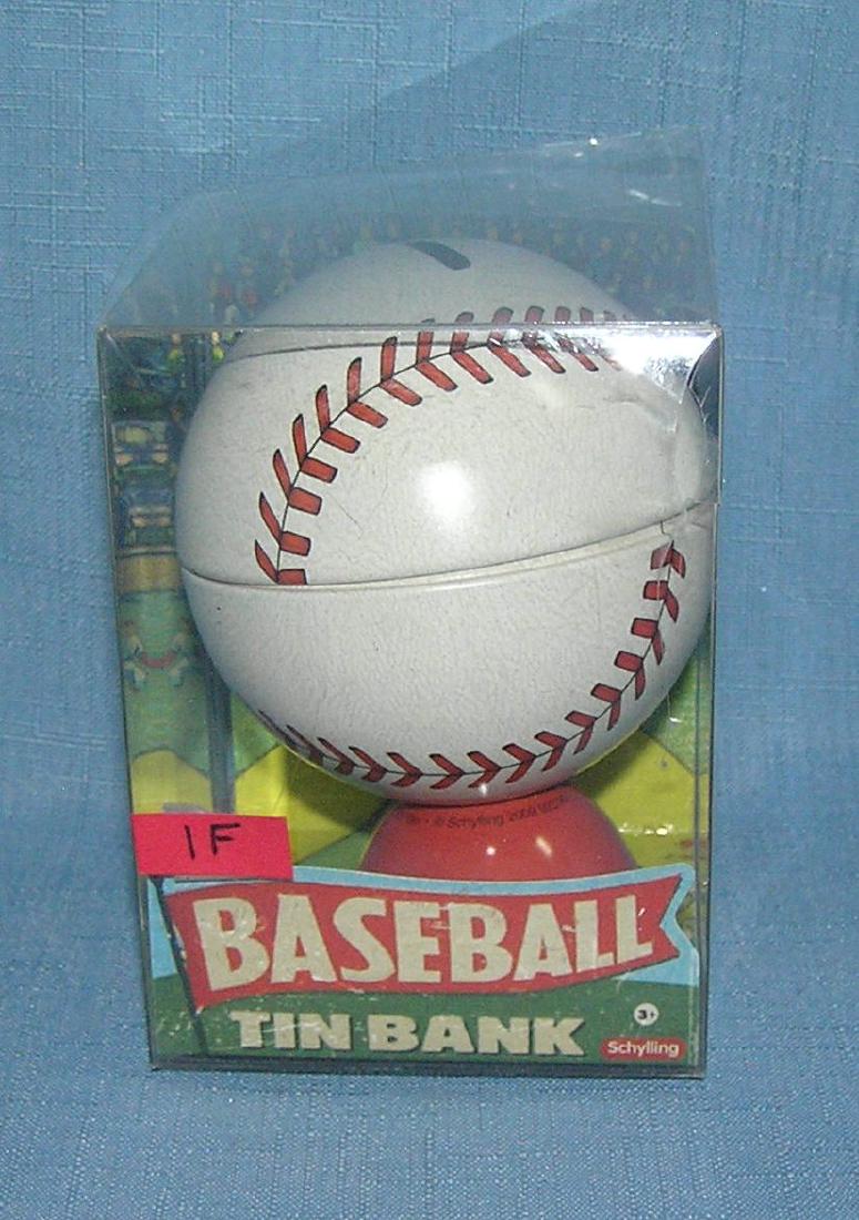 Tin baseball bank with original box: Tin baseball bank with original box est. value $15.00-$20.00