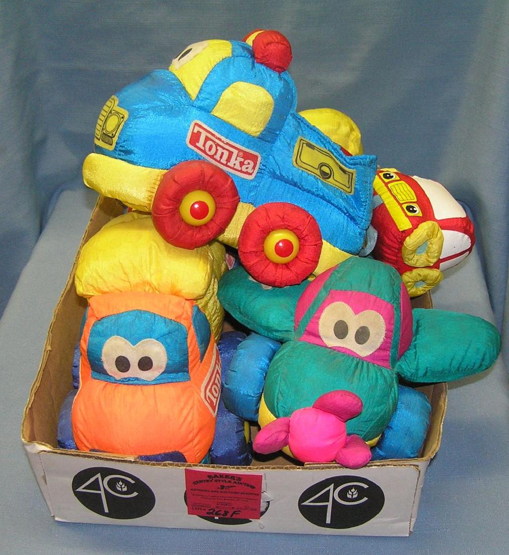 Box full of vintage Tonka plush toys: Box full of vintage Tonka plush toys and trucks est. value $40.00-$50.00