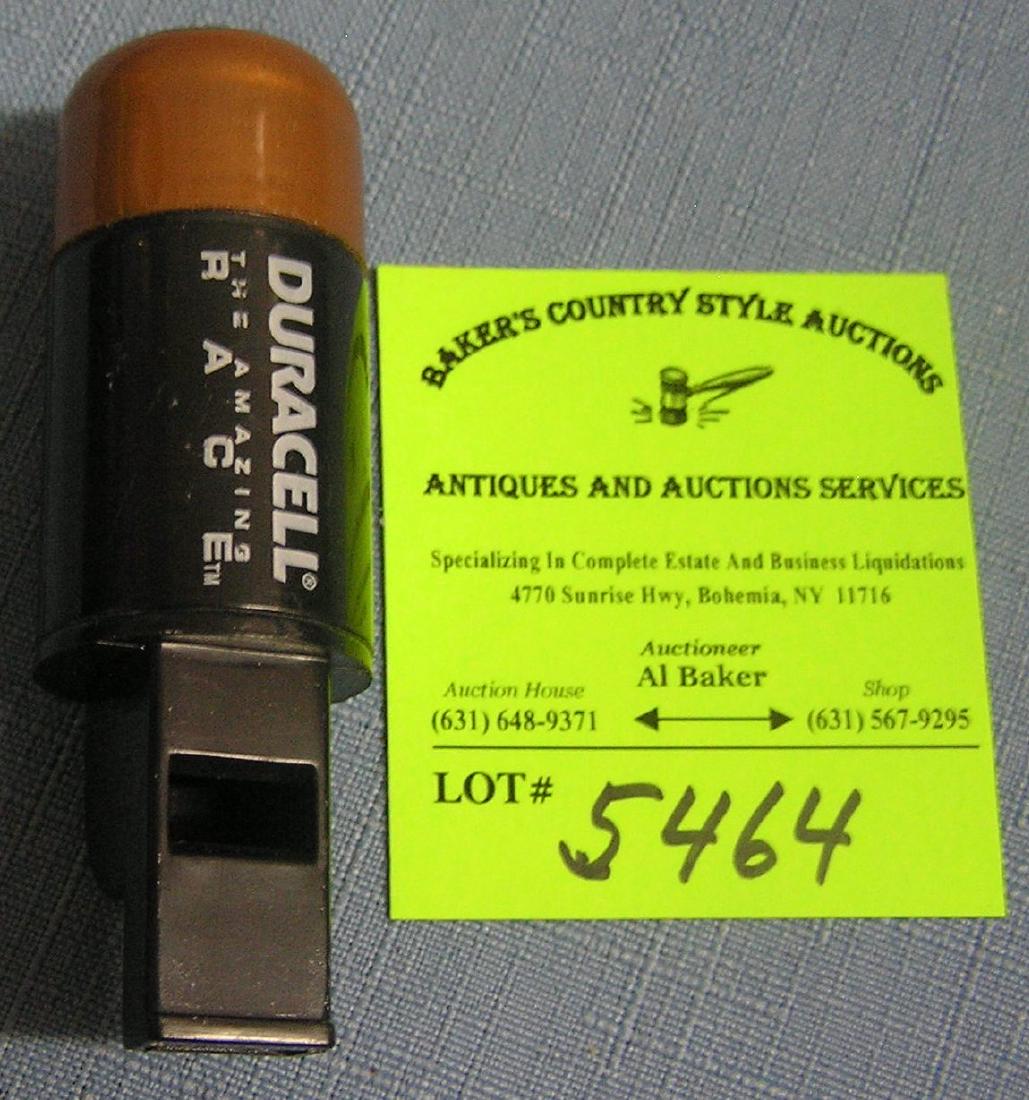 Duracell battery shaped whistle and compass: Duracell battery shaped whistle and compassest. value $25-$35.00