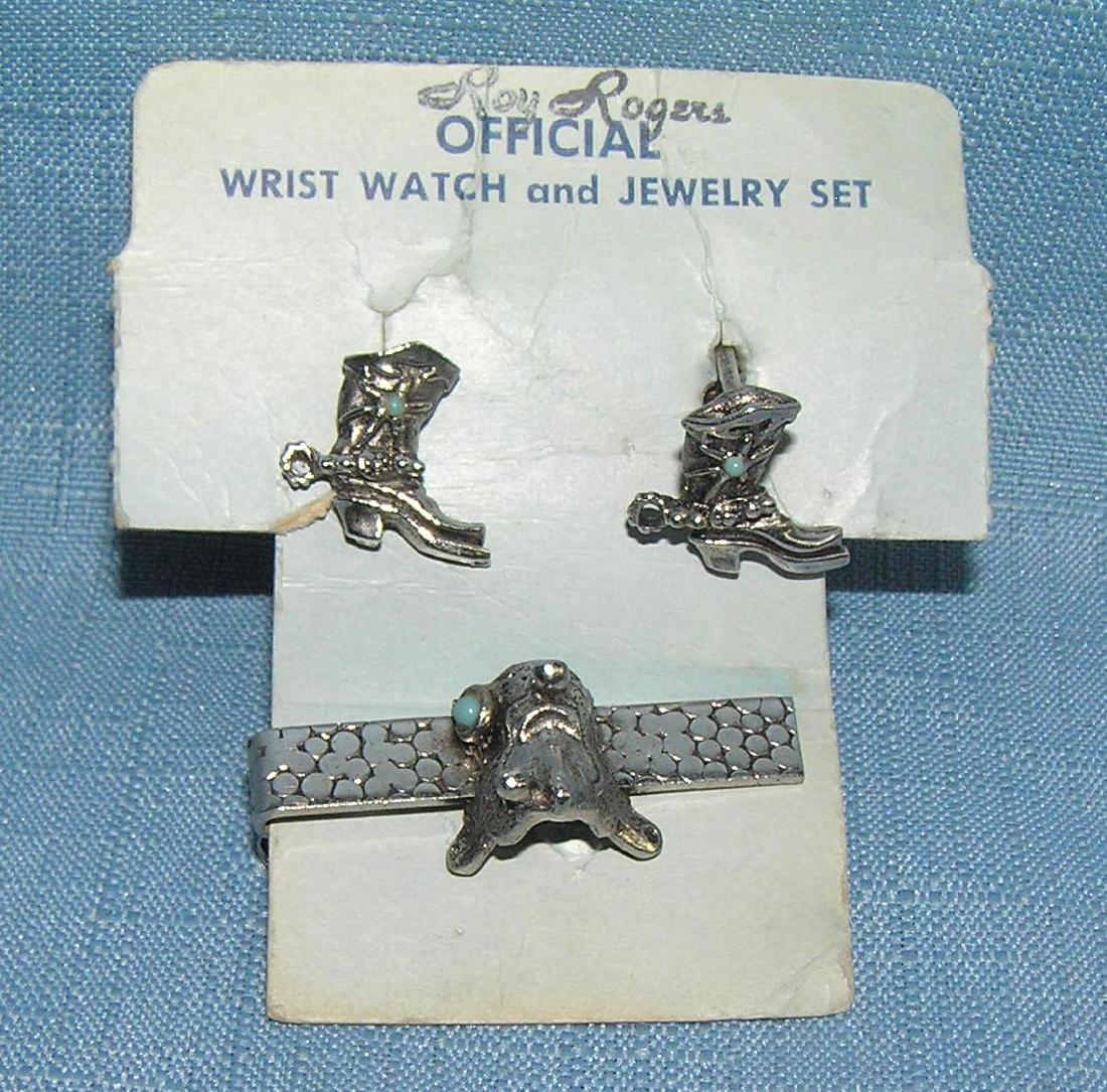 Vintage Roy Rogers cuff links and tie bar set: Vintage Roy Rogers cuff links and tie bar set mint on card circa 1950's est. value $40.00-$50.00