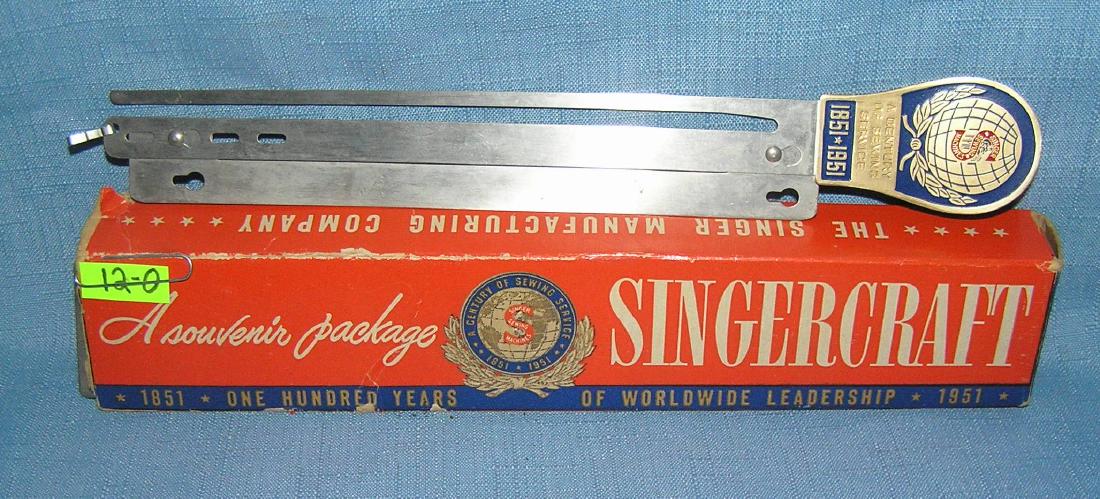 Singer sewing machine 100th anniversary souvenir: Singer sewing machine 100th anniversary souvenir package includes a Singer Kraft device for rug making 1851 to 1951 est. value $65.00-$75.00