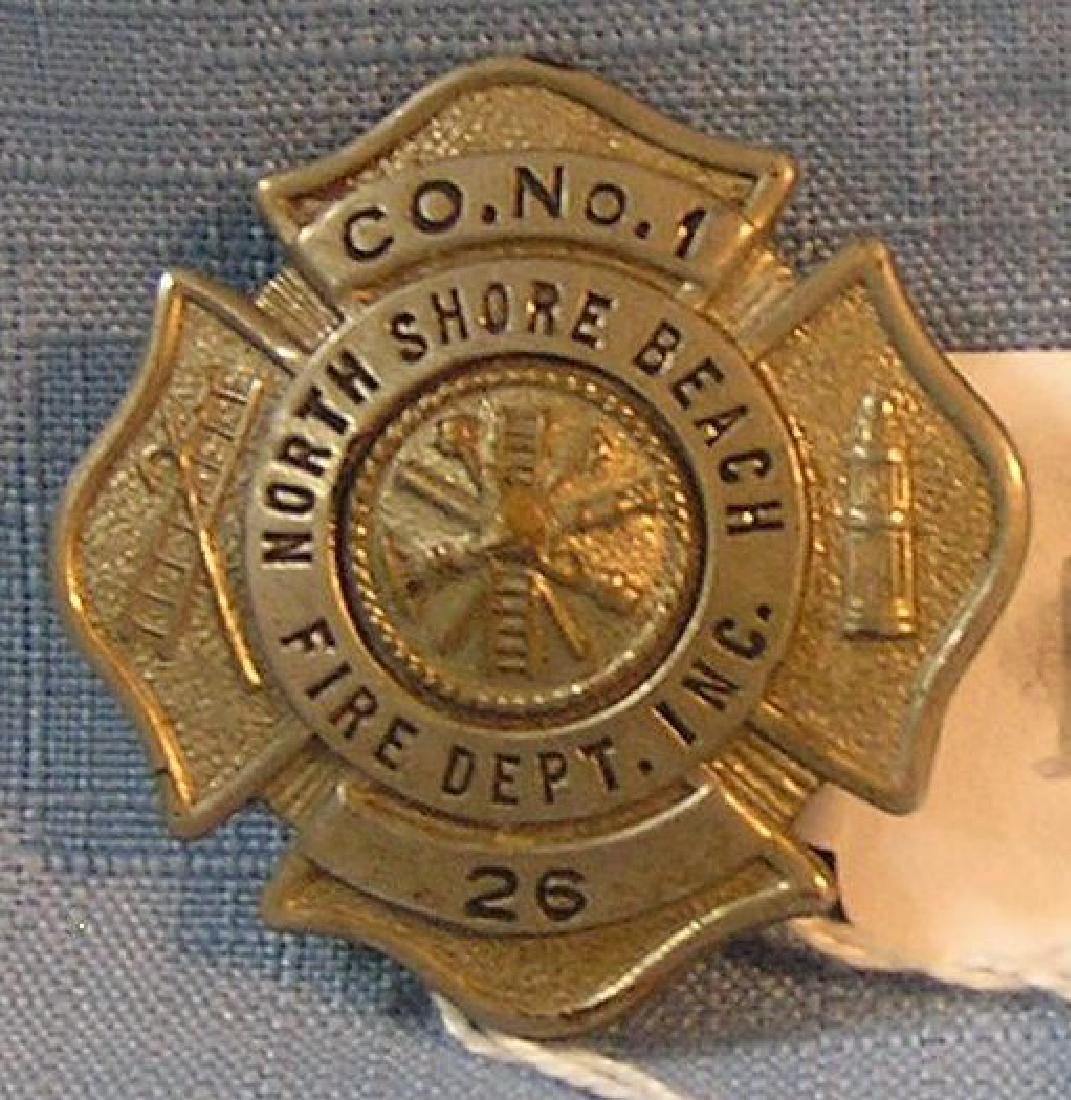 Vintage N. shore beach fire dept badge: Vintage North shore beach Long Island fire department badge est. value $100.00-$125.00
