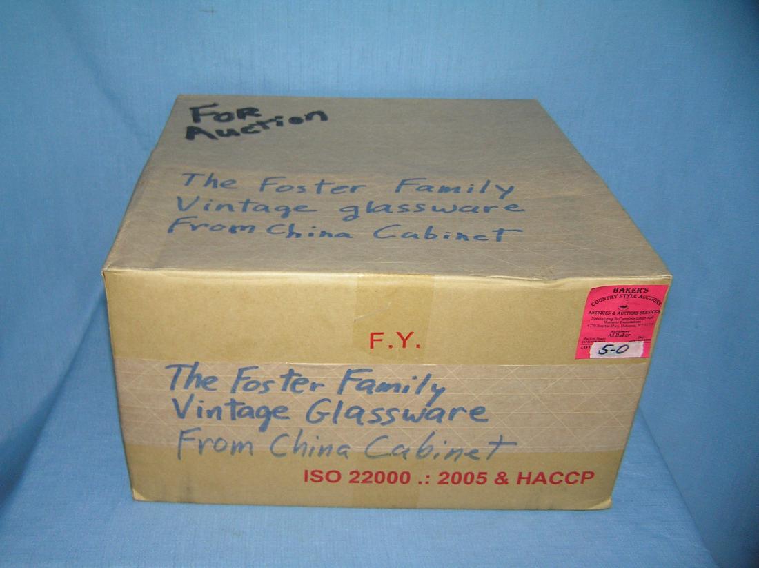 Moving and storage Co mystery box: Moving and storage Co mystery box marked Foster family glassware from china cabinet est. value $25.00-$30.00.