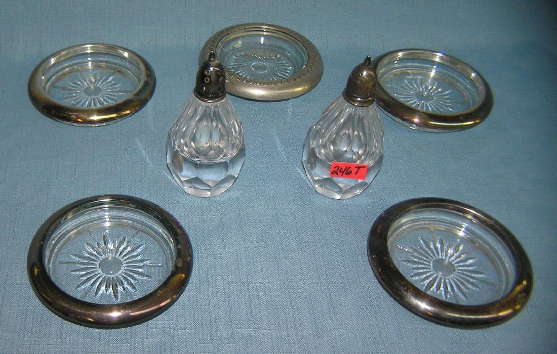 Group of sterling silver and silver plate accessories: Group of sterling silver and silver plate accessories including crystal and sterling silver salt and pepper shakers and crystal and silver plate coasters made in Italy est. value $40.00-$50.00