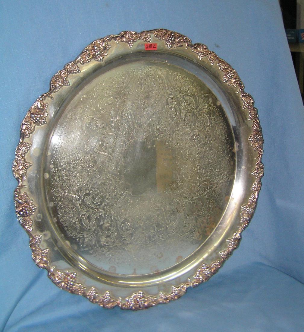 High quality silver plated serving platter: High quality ornate grape decorated large 19 1/2 inch circular silver plated serving platter by Towle Silver Plate Co. est. value $125.00-$150.00