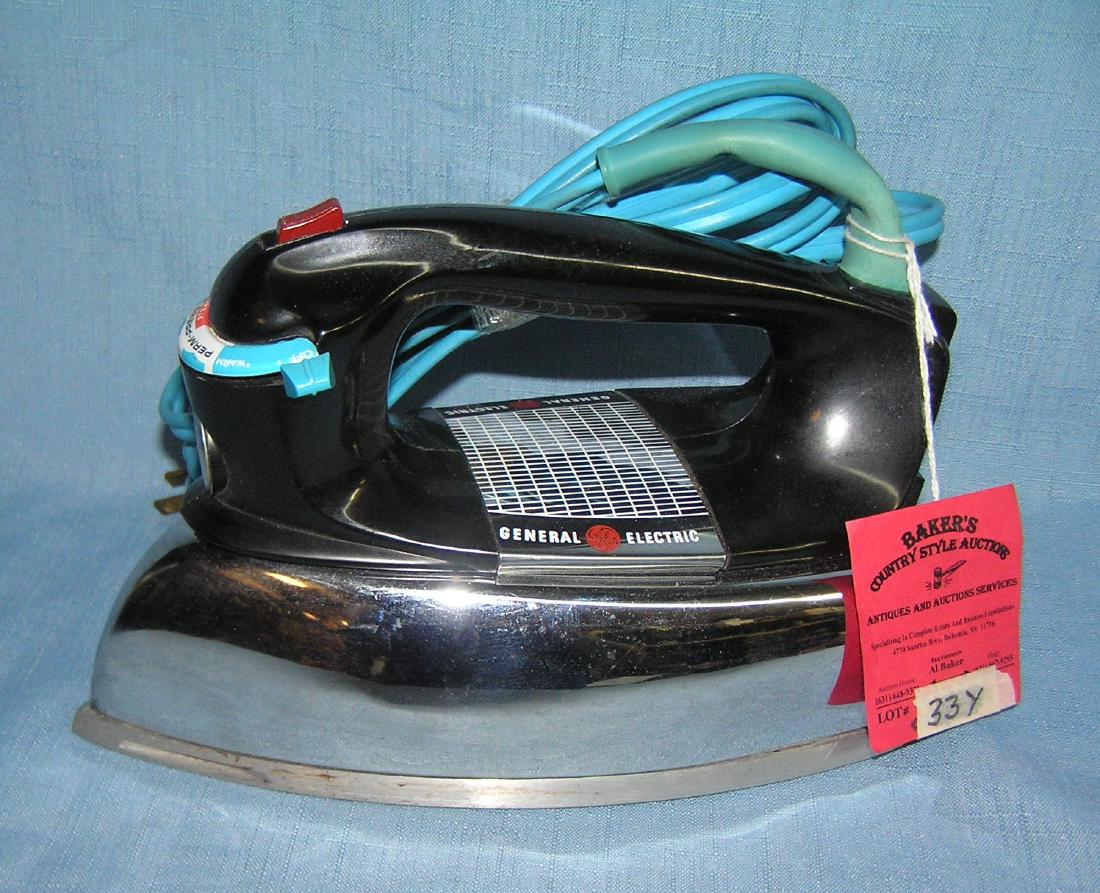 General Electric electric iron with steam: General Electric electric iron with steam for permanent press est. value $30.00-35.00