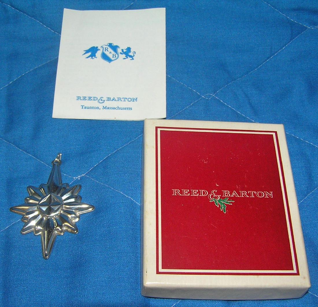 Sterling silver Reed and Barton necklace pendant: Sterling silver Reed and Barton Christmas star necklace pendant with original booklet and box est. value $30.00-$35.00
