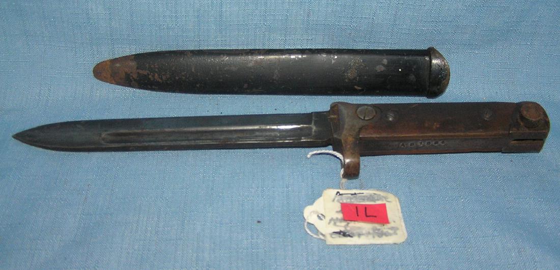 WWII fighting bayonet with scabbard: WWII fighting bayonet with scabbard est. value $240.00-$260.00