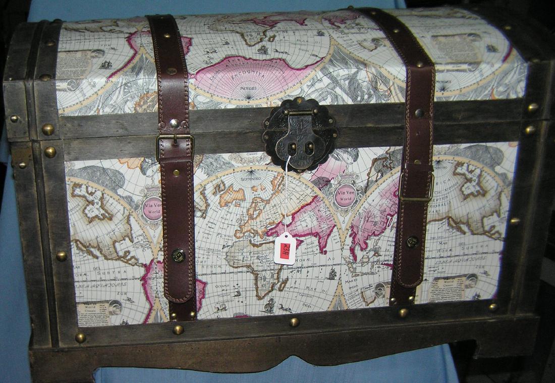 Domed topped pirates treasure chest: Domed topped pirates treasure chest great modern era storage/treasure chest 18 inches deep by 29 inches wide by 20 inches high made of a mixture of materials including wood and leather part of a movin