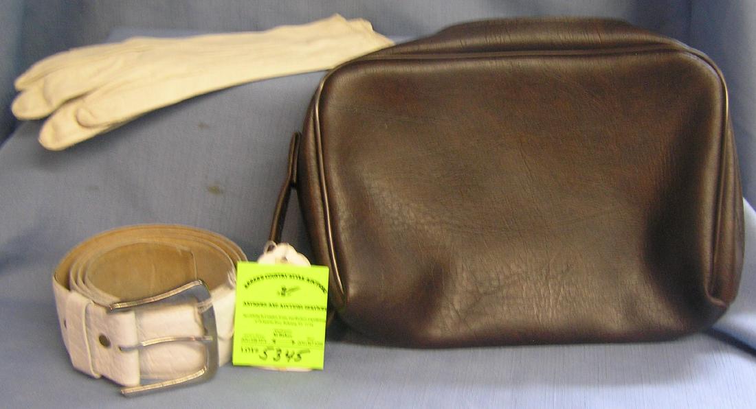 Vintage Accessories includes belt, gloves and more: Group of vintage Accessories includes belt, gloves and carry bag est. value $40.00-$50.00